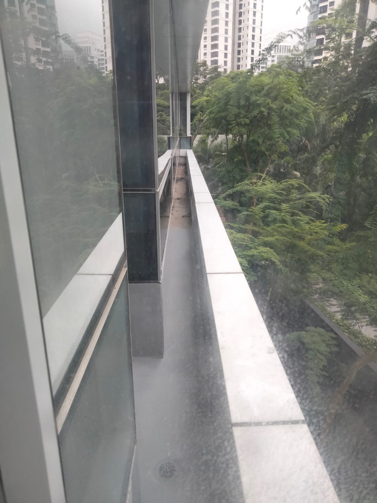 Reinforced concrete gutter after a new waterproofing membrane has been applied