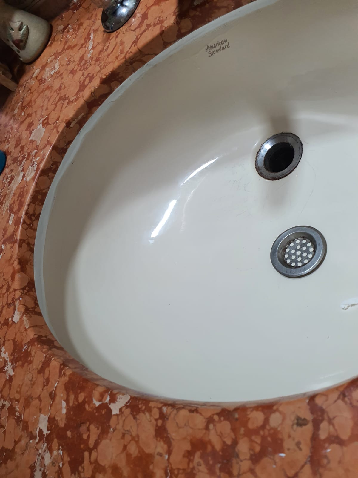 Neatly finished silicone sealant line at a wet area junction after remedial work